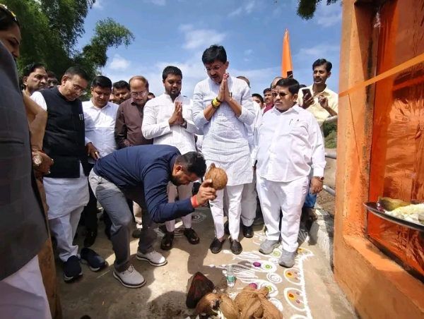 अ