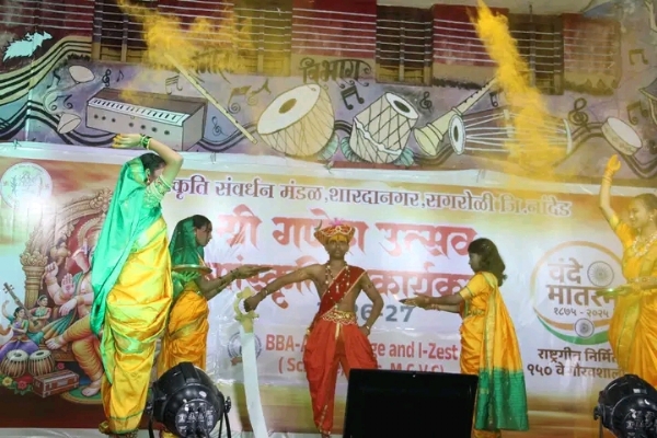 अ