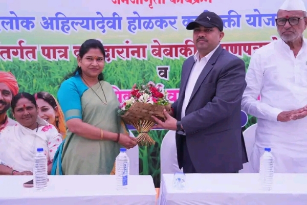 अ