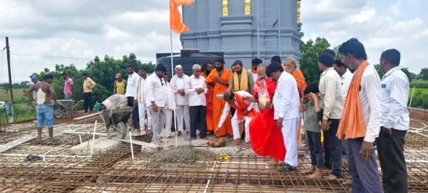 अ